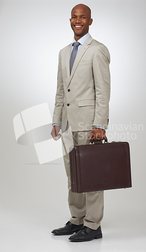 Image of Businessman, portrait and briefcase in studio confidence as professional law attorney for corporate, career or white background. Male person, bag and client trust or working, employee or mockup space