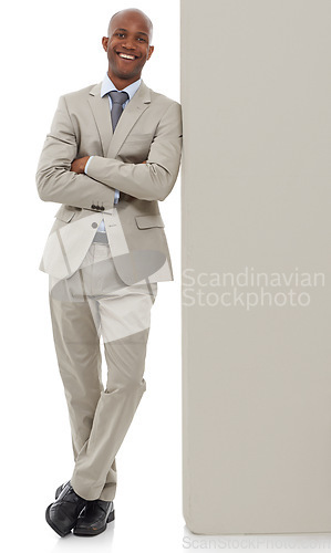 Image of Happy businessman, portrait or leaning on wall in confidence with arms crossed on a white studio background. Young black man or professional employee smile in business fashion or suit on mockup space