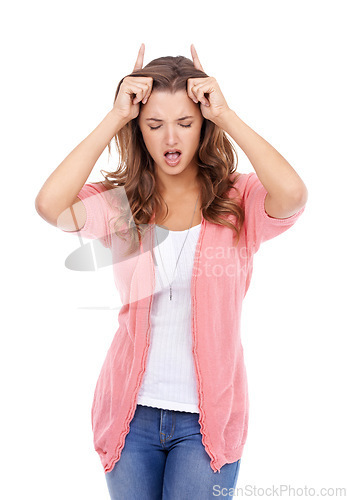 Image of Woman, playful and devil horns in studio, bully and naughty gesture for attitude on white background. Female person, bad girl and fingers for emoji, bull and comedy or humor on isolated backdrop