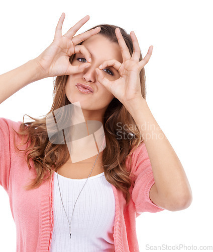 Image of Hand glasses, portrait and woman in studio with funny, silly or goofy personality on white background. Eyes, frame and face of female model with finger shape for nerd, gesture or crazy, playful mood