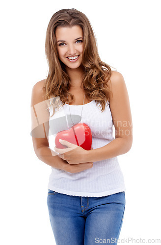 Image of Woman, portrait and heart for love in studio, smiling and confidence with emoji on white background. Female person, happy and symbol for romance on valentines day, support and peace or kindness