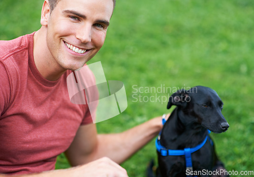 Image of Man, dog and portrait on outdoor field for bonding connection, pet training for obedience. Male person, animal and face at rescue shelter garden for happy home care, environment walk on grass hug