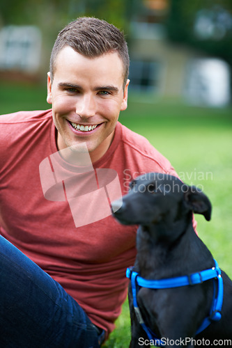 Image of Man, dog and portrait at outdoor love for bonding connection, pet training for obedience. Male person, animal and face at rescue shelter garden for happy home care, environment walk on grass field
