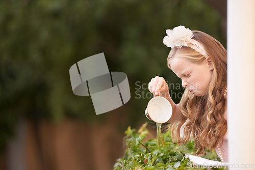 Image of Child, tea and pouring or disgust in garden for gross taste at party event or unhappy, drink or disappointed. Female person, girl and cup or warm beverage fail for strong flavour, outdoor or backyard