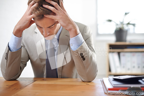 Image of Businessman, stress and burnout in office for work, mental health and bankrupt or overwhelmed. Male person, professional and frustrated in workplace, deadline and depression or mistake and fail