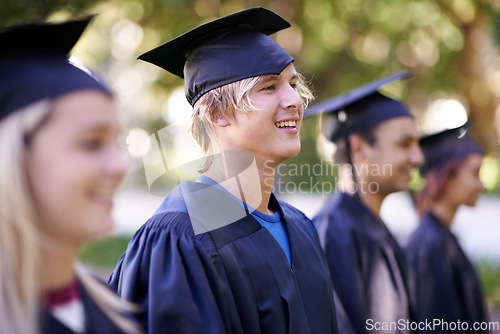 Image of Man, graduate and university achievement for education with ceremony outdoor. Students, smile and graduation event for academic success, higher learning and certification with pride and profile