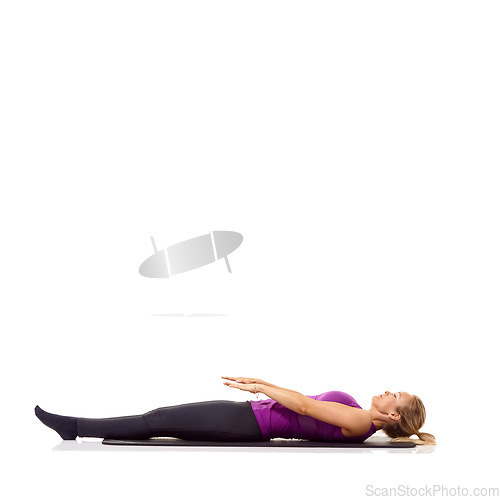 Image of Yoga mat, health and wellness with woman in studio for peace, exercise and relax. Workout, fitness and self care with female person on floor of white background for pilates, body or mockup space