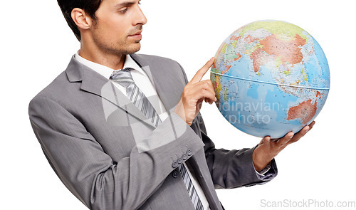 Image of Business man, globe and destination choice isolated on a white studio background. Agent, professional suit and planet map for geography, international travel or pointing at worldwide earth on journey