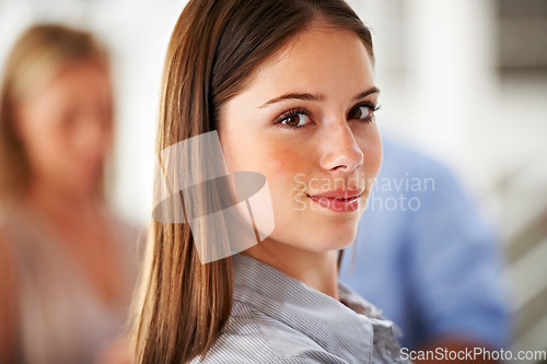 Image of Portrait, happy and internship with a business woman in her office on a blurred background for career. Face, mindset and confident with a young employee closeup in the workplace of a design agency