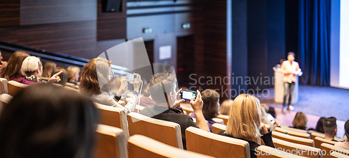 Image of Conference and Presentation. Audience at the conference hall. Business and Entrepreneurship. Faculty lecture and workshop. Audience in the lecture hall. Academic education. Student making notes
