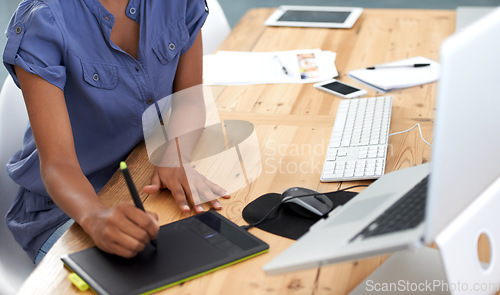 Image of Business, woman and hands with tablet or writing in office for web design, technology and planning at desk. Digital, person and designer with laptop for photoshop, creative and editing at workplace