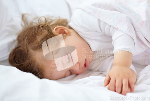 Image of Face, baby and kid sleeping on bed for calm break, peace and dreaming to relax at home. Tired young child asleep with blanket for newborn development, healthy childhood growth or rest in nursery room