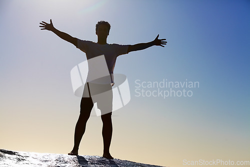 Image of Man, horizon and freedom, blue sky and hiking in nature for adventure and fitness, mockup space and travel. View while trekking, journey and hiker with outdoor view, sun and exercise on mountain