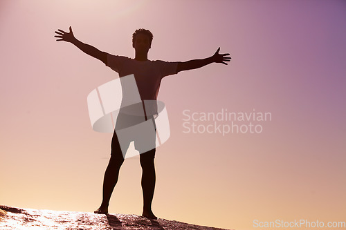 Image of Man, horizon and freedom in sky with hiking in nature for adventure and fitness, mockup space and travel. View with trekking, journey and hiker outdoor with sunset color and exercise on mountain