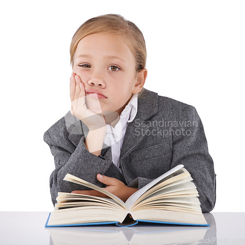 Image of Bored, child and reading book in studio portrait, learning and fiction novel on white background. Female person, fatigue and information for education, exhausted and tired for studying literacy