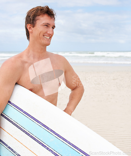Image of Thinking, smile and body of man with surfboard at beach on blue sky for sports, travel or fitness. Nature, vision and happy young shirtless surfer on sand by ocean or sea for exercise and training