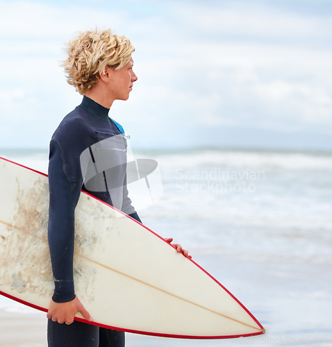 Image of Surfer, man and sea view on beach with surfboard, vacation and adventure for fitness and travel. Ocean, waves for surfing and seaside holiday in Hawaii, nature and tourism with extreme sports