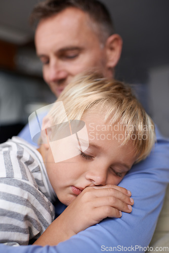 Image of Father, son and sleeping with hug in home with bonding, trust and support in living room of house. Family, man and parent or boy child with rest, dreaming and tired or relax in lounge of apartment