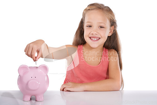 Image of Girl kid, piggy bank and coins for portrait, studio and pride with smile for investing by white background. Child, container or animal toys with relax for money, cash or happy for financial education