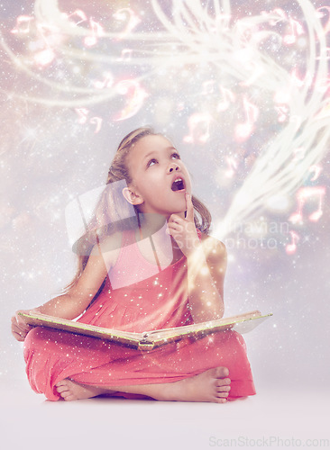 Image of Child, book and magic fantasy or creativity for music listen or storytelling dream, sound or imagination. Female person, kid and whimsical notes or white background in studio, supernatural or mockup