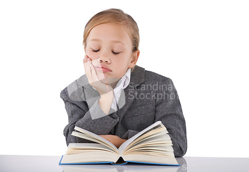 Image of Sleeping, child and reading book in studio, learning and fiction novel on white background. Female person, fatigue and info for education, exhausted and tired for studying literacy and knowledge