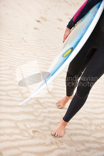 Image of Surfer, man or feet on beach sand with surfboard on vacation or adventure for fitness, walking or travel. Legs of athlete, outdoor or surfing at sea on holiday in Hawaii or ocean in extreme sports