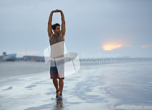 Image of Health, stretching and beach with man, fitness and vacation with summer break and morning. Travel, ocean and person with holiday or seaside with with exercise, peaceful and water with wellness or sky