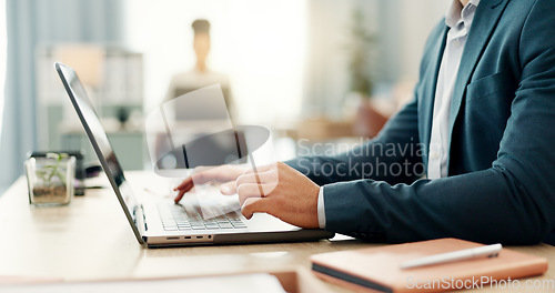 Image of Hands of man at desk, laptop and typing in coworking space, research and online schedule at consulting agency. Office, networking and businessman at computer writing email review, feedback or report.