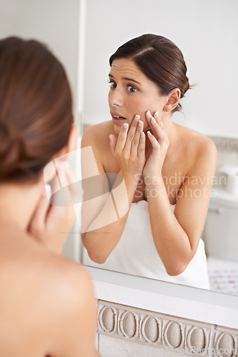 Image of Skincare, mirror reflection or woman stress over skin breakout, acne crisis or pimple outbreak in home bathroom. Beauty problem, dermatology and person feel zit, allergic reaction or treatment fail