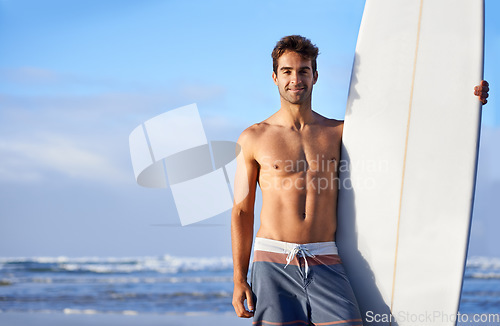 Image of Beach, surfing and portrait of happy man with surfboard for, waves on summer vacation, weekend and holiday. Travel, nature and face of person by ocean for water sports, adventure and fun in Australia