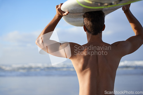 Image of Beach, surfing and back of man with surfboard for waves on summer vacation, weekend and holiday by sea. Travel, nature and person by ocean for water sports, adventure and fun hobby in Australia