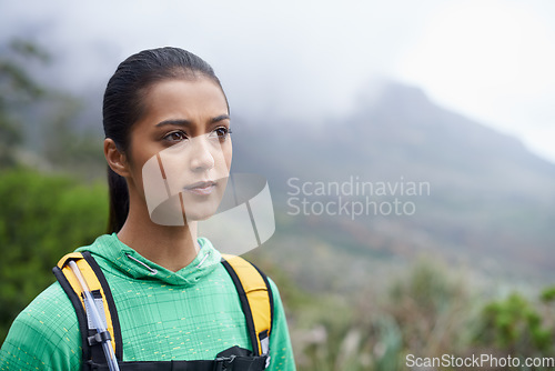 Image of Arms crossed, hiking and woman with exercise, thinking and mountains with workout and fresh air. Person, girl and hiker with wellness, nature and training for health and active with hobby and fitness