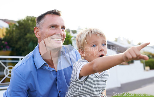 Image of Bonding, father and child in garden pointing with excited, smile and outdoor view in backyard. Happy man, son and quality time together in neighborhood with learning, discovery and support from dad.