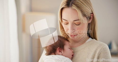 Image of Newborn, love and mother with baby for sleeping, bonding and child development together at home. Family relationship, motherhood and mom carry infant for care, support and dreaming in nursery room