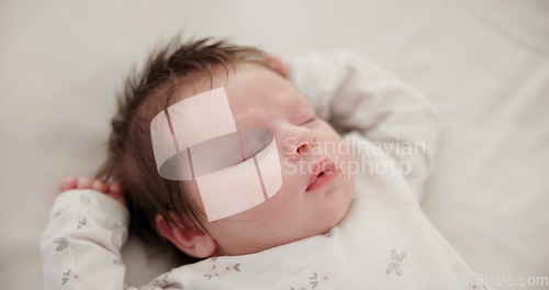 Image of Tired baby, sleeping and nursery bed with morning, nap and dreaming of a young newborn at home. Cozy, sleepy kid and calm with health development from rest and peace in a house with closeup and care