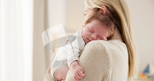 Image of Care, love and mother with baby for bonding, relationship and child development together at home. New born, motherhood and happy mom carry infant for sleeping, support and affection in nursery room