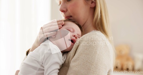 Image of Love, mother and baby in nursery for sleeping, bonding and touch or cuddle with support or care. Woman, mom or holding newborn in bedroom with bond and relax for child development and nurture in home