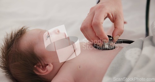 Image of Baby, stethoscope and doctor listening to heart, breathing and test kids healthcare in clinic. Infant, heartbeat and hand of pediatrician examine patient, chest and check cardiology health of lungs