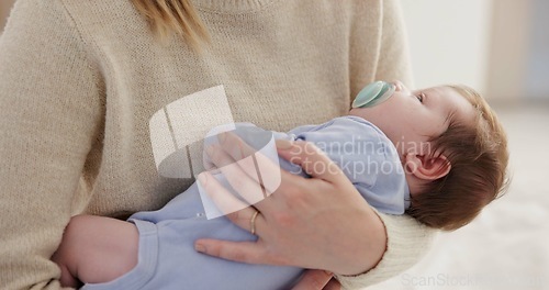 Image of Mother, relax baby and nap with love, care and support for newborn in nursery with sleep. Young child, mom and family with youth and childcare with bonding and maternity in home with infant and calm