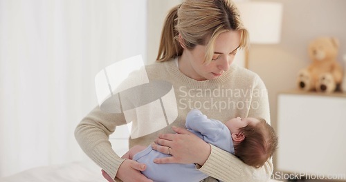 Image of Mother, baby and nap with love, care and support for newborn in nursery with sleep. Young child, mom and family with youth and childcare with bonding and maternity in a home with infant and rocking