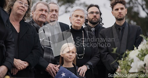 Image of Funeral, cemetery and family with American flag for veteran for respect, ceremony and memorial service. Sad, depression and people by coffin in graveyard for military hero, army and soldier mourning