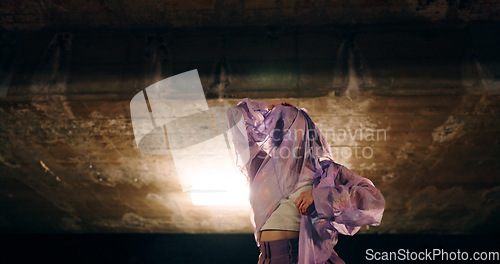 Image of Japanese woman, dancing and night in city, moving body and freedom for street performance in nature. Girl, dancer and person with art, concert and steps for creativity, expression or balance in Tokyo