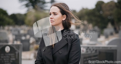 Image of Rose, death or sad woman in cemetery for funeral. spiritual service or burial to respect the Christian religion. Mourning, depressed or person in graveyard thinking of grief, loss or goodbye farewell