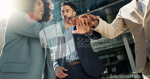 Image of Business people, hands stack celebration and excited in city for goals, support and profit on investment. Men, woman and cheers together for winning, success and achievement with team in Cape Town