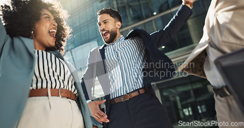 Image of Business people, hands stack celebration and excited in city for goals, support and profit on investment. Men, woman and cheers together for winning, success and achievement with team in Cape Town