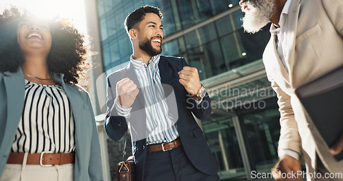 Image of Business people, hands stack celebration and excited in city for goals, support and profit on investment. Men, woman and cheers together for winning, success and achievement with team in Cape Town