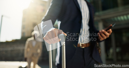 Image of Business man, phone and suitcase in street, hands and search for location, travel and transport to airport Corporate employee, smartphone and walk with baggage, luggage or urban sidewalk in Cape Town