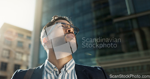 Image of Businessman, vision and city in travel for opportunity, dream job or career ambition outside building. Face of man or employee thinking with business mindset for outdoor inspiration in an urban town