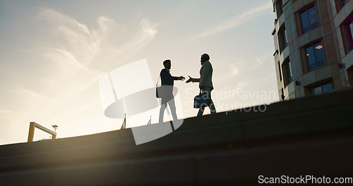 Image of Business people, handshake and city silhouette for partnership, outdoor introduction and travel meeting. Corporate clients or men shaking hands for welcome, hello and agreement or career opportunity