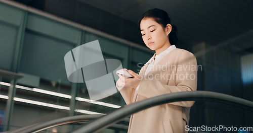 Image of Japanese, escalator and travel with businesswoman, phone or social media with internet, employee or convention. Person, consultant or worker with airport, communication or connection with mobile app